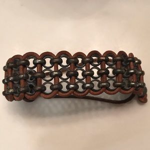 Distressed leather bracelet w/ grommets